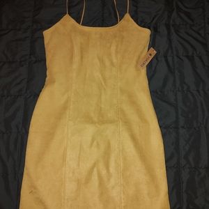 Dark yellow dress, suede material.
